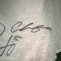 White shirt with Pato O’Wards signature and other Indycar drivers ￼