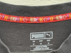 Puma x Lance Wyman Men’s Tee Shirt MEDIUM Power Through Peace Defenition Graphic