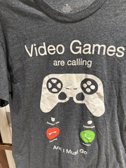 NWOT Funny video games are calling T-Shirt size medium. Short sleeve. 50/50