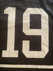 Champion #19 Champion Logo Hockey Jersey Sz L (44) (25in W X 30in L) Black