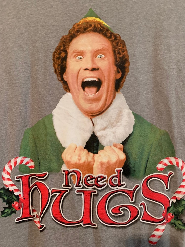 NWOT – NEED HUGS ELF Movie Image Gray Adult Size L Short Sleeve Tee