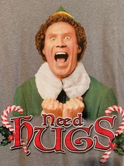 NWOT – NEED HUGS ELF Movie Image Gray Adult Size L Short Sleeve Tee