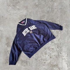 90s vintage notre dame university windbreaker with an embroidered logo