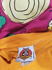 Vintage Lot Of 8 T-shirts Various Sizes Looney Tunes, NFL, Garfield, Ect.