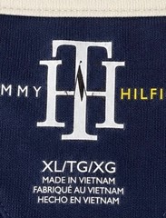 Tommy Hilfiger V-Neck T-Shirt Men’s XL Navy Blue Stripe Sleeve Crest Logo Casual