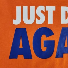 Nike Just Do It Again Men’s XL Orange Long Sleeve T-Shirt Ribbed Cuffs NWOT Flaw
