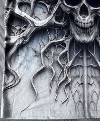 “ROOTED SKULL”