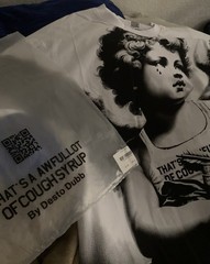 Cupid graphic White T-Shirt “That’s a Awful Lot of Cough Syrup”