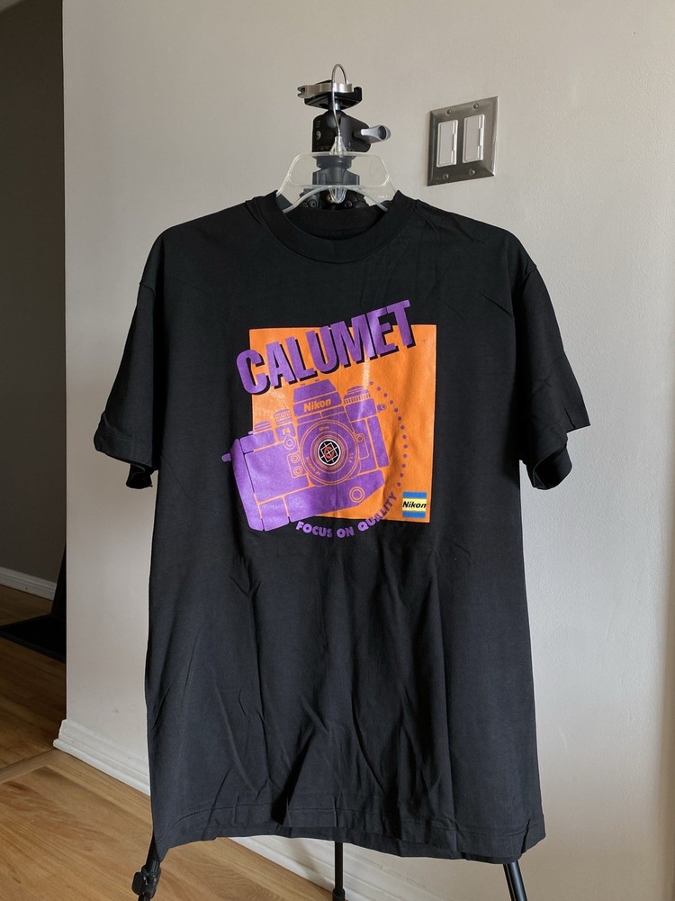 Vintage 90s Promo Tee Shirt “CALUMET / NIKON”. NEW: never be worn.