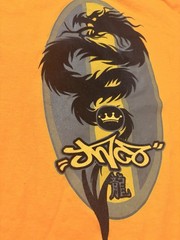 Vintage 1990s JNCO Jeans Orange T-Shirt Boys Youth Large. Made in USA.