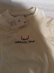 New shirt with label with print on the back
