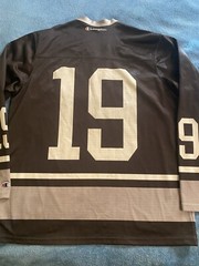 Champion #19 Champion Logo Hockey Jersey Sz L (44) (25in W X 30in L) Black