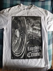 T-Shirt “Lowriding is not a Crime” design printed on a Shaka Wear blank Size L