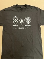 Get your Black & White Brazil vs Morocco T-shirt in M-L-XL while they LAST!