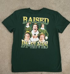 Elf Unisex Adult Size Small Short Sleeve ‘Raised by Elves’ Graphic T-Shirt Green