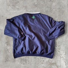 90s vintage notre dame university windbreaker with an embroidered logo