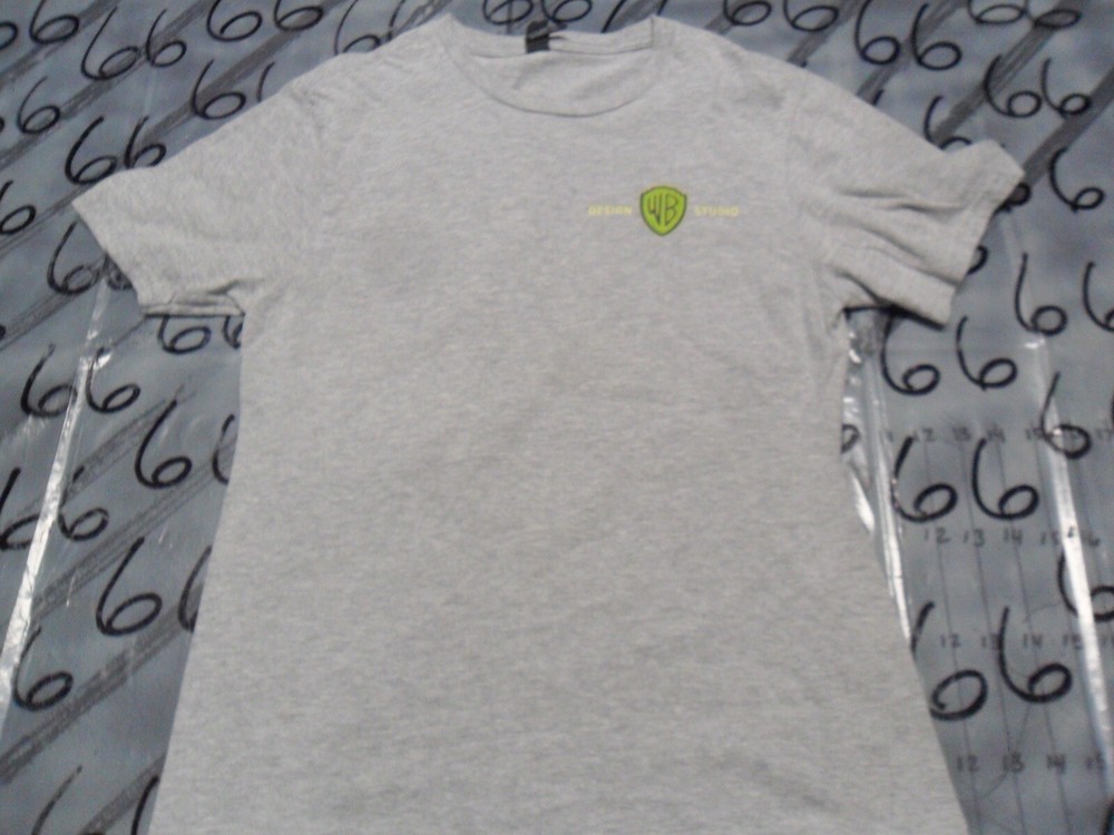 Small Warner Bros Design Studio Turning Imagination To Reality Damaged T Shirt