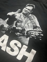 Johnny Cash black cotton has 2 small stains as shown on 4th slide t-shirt Size L