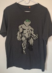 Undercover t-shirt graphic of a muscular “strawberry monster” 2007 collection.