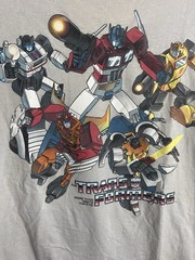 TRANSFORMERS NWT Gen 1 “More Than Meets The Eye” 2009 T-Shirt Men’s Large Gray