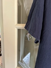 United States Navy T and ironically the color is navy with white lettering. XXL