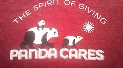 XS NWOT The Spirit Of Giving Panda Cares Shirt