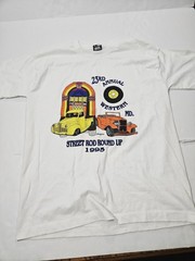 Vintage Lot Of 8 T-shirts Various Sizes Looney Tunes, NFL, Garfield, Ect.