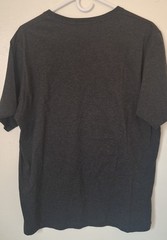 Undercover t-shirt graphic of a muscular “strawberry monster” 2007 collection.