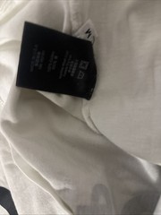 RHUDE World Championship Ivory Cotton Graphic Short Sleeve. Marks Under Arms