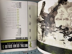 Metal Gear Solid collector lot with Uniqlo 25th Anniversary shirt