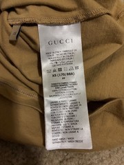 GUCCI MIRROR LOGO CAMEL T-SHIRT WITH PURPLE & YELLOW DESIGN (SIZE XS OVERSIZED)