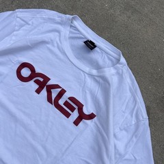 Boxy Oakley white spellout t-shirt with red text logo