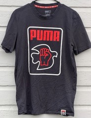 Puma x Lance Wyman Men’s Tee Shirt MEDIUM Power Through Peace Defenition Graphic