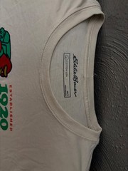 Eddie Bauer Sasquatch t-shirt features a red bigfoot graphic with a g