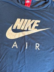Vintage Nike Air Women’s Metallic Gold Logo Curved Hem T-Shirt