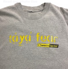 GRAY TAYA FEAR CHAMORRO FACTOR GRAPHIC T-SHIRT, CHEST 44 IN, LENGTH 28 IN