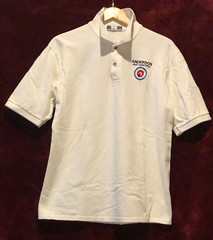 With Polo Shirt by Jerzees – half sleeves with company logo, size US Adult Large