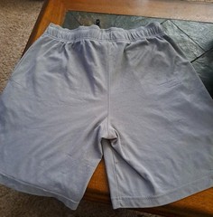 Lot Of Men’s Clothing. Muscle Shirt, New T-Shirt, And Pair Of Shorts. 3 Pieces