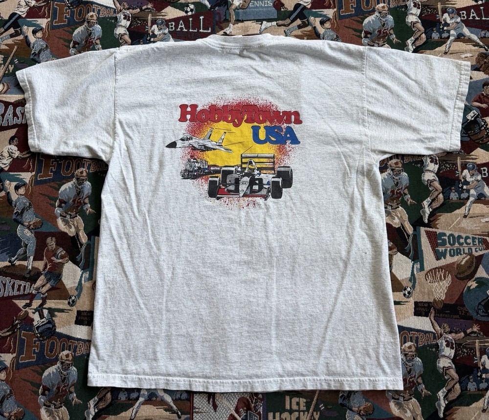 Vintage 90s Men’s Gildan Hobby Town USA Gray Graphic T-Shirt Size XL