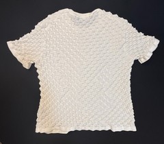 Silversilk textured knit with a raised geometric pattern; white XX (slim)
