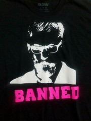 Banned Galvin Mcinnes T-Shirt Size XL Black with Pink Writing. Quote on back.