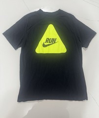 Nike “RUN” graphic t-shirt featuring a bold neon yellow triangle logo