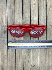 NEW! eBay Swag Lot – Shirt, Ear Buds in Container, Sunglasses, Sticker