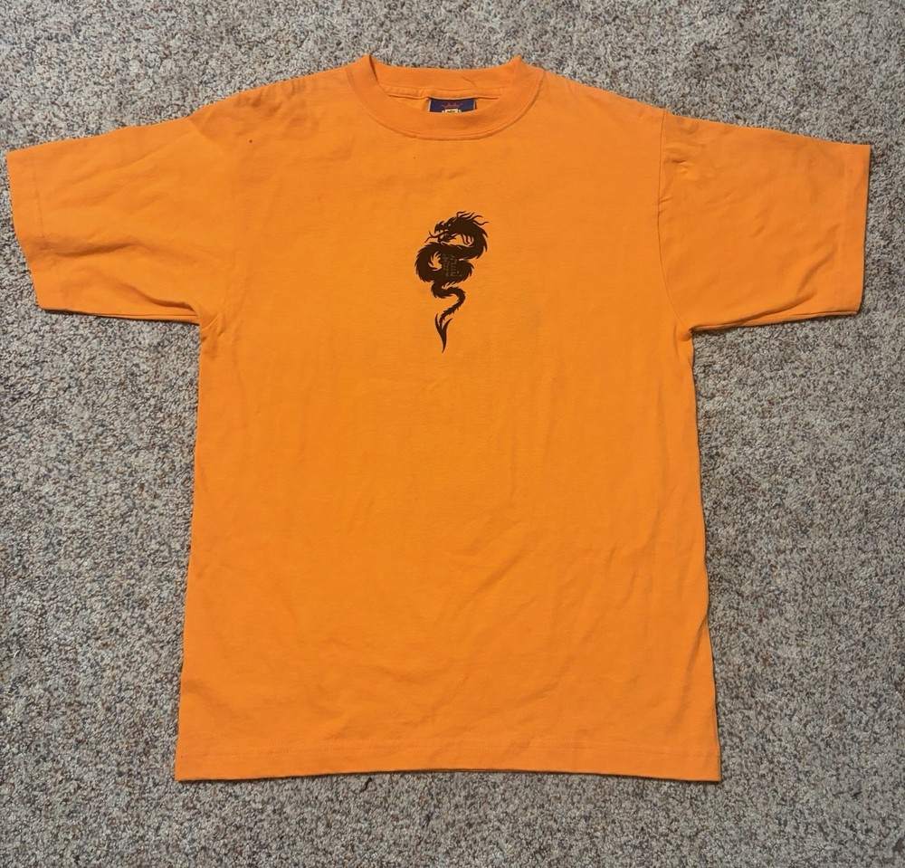 Vintage 1990s JNCO Jeans Orange T-Shirt Boys Youth Large. Made in USA.