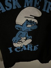 The Smurfs Men’s Brisco Brands Grumpy Smurf Ask Me If I Care T Shirt Size L