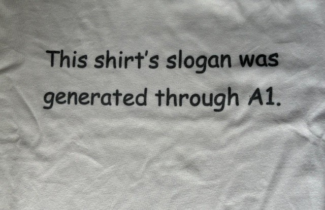 T-Shirt funny “This shirt’s slogan was generated through A1.” 60% cotton 40% pol