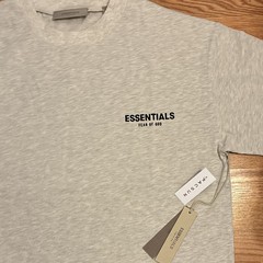 Fear of God Essentials light oatmeal short sleeve T-Shirt Size L, fits a XL