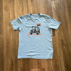 TravisMathew Men’s Tops & Outerwear Golf Cart AZ Flag Graphic T-Shirt