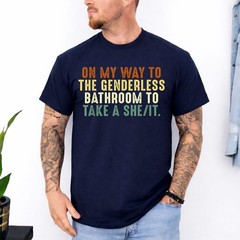 On My Way To The Genderless Bathroom To Take a She_It T-Shirt