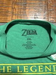 The Legend of Zelda Size 2XL Green Shirt Gold Triforce Nintendo Seal Sticker NEW